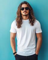 Model poses confidently in a blank t-shirt by a colorful wall photo