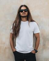 A model with long hair poses confidently in a blank t-shirt and sunglasses photo