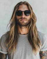 Model displays a stylish blank t-shirt, exuding a cool, casual vibe photo
