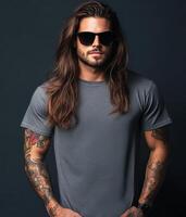 A handsome model exudes confidence while wearing a blank t-shirt photo