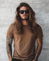 A handsome model poses confidently in a blank t-shirt, exuding style photo