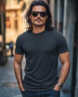 Handsome model poses confidently in a trendy blank t-shirt while wearing sunglasses photo