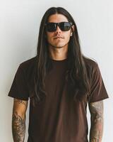 Handsome model displays a blank t-shirt while rocking cool sunglasses photo