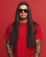 Tall model flaunts a blank red t-shirt with cool sunglasses and long hair photo
