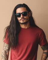 The model poses confidently in a blank t-shirt and sunglasses photo