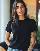A confident woman presents a versatile black t-shirt with a chic look photo