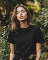 A woman stands gracefully in a vibrant green garden, exuding confidence photo