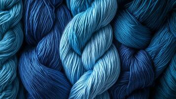 Soft blue yarns twist together, inviting creativity and artistry in crafting projects photo