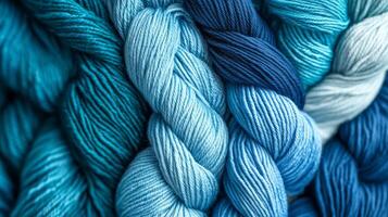 Beautiful strands of blue yarn create a stunning visual display of texture photo