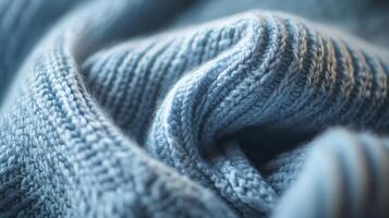 Textured blue yarn reveals intricate patterns in natural light photo