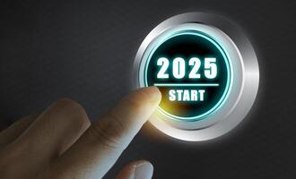Finger about to press a car ignition button with the text 2025 start. Year two thousand and twenty five concept. photo
