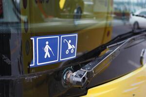Enhancing accessibility with yellow checkerboard symbols for public transportation icon display photo