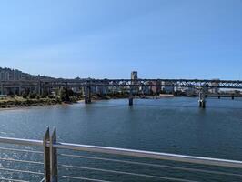 Portland, Oregon, USA - 07.11.2024 View from the Ross Island Bridge to the Marquam Bridge and the city photo