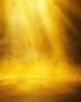 Golden rays of light shining down through the dust in a dark room photo