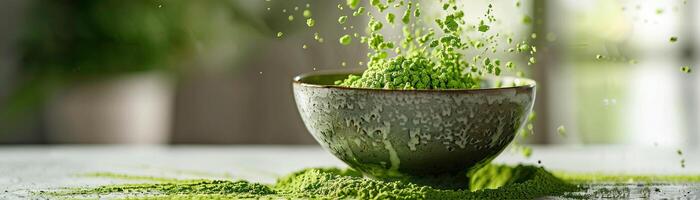 Matcha powder falling into a bowl photo
