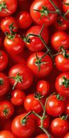 A close-up image of a bunch of ripe red cherry tomatoes. photo