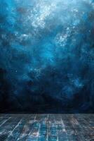 Blue grunge background with wooden floor photo