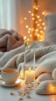 Blank clear straight candle glass amidst a setting with a plush pillow, a scented diffuser, and delicate string lights, modern warm bedroom mockup, serene and stylish photo
