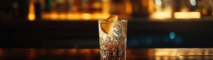 1 An elegant, dimly lit shot of a gin tonic on a cozy bar table, the warm ambient light inviting, panoramic negative space above for minimalist text photo