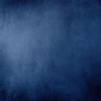 Dark blue grunge textured background, ideal for design projects, backdrops, and creative applications with a moody, vintage feel. photo