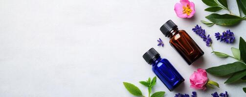 Elegant setup of essential oils with flowers and leaves, perfect for wellness, aromatherapy, and skincare concepts. photo