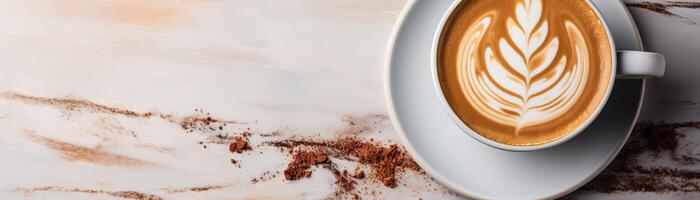 Cappuccino with beautiful latte art on marble background photo