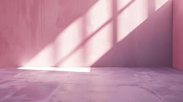 Pink concrete room with sunlight shining through the window. photo