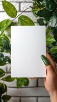 a etsy listing image displaying a 5x7inch blank white page being held by a womans hand ,in the sakura style of handcrafted designs photo