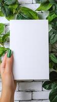 a etsy listing image displaying a 5x7inch blank white page being held by a womans hand ,in the sakura style of handcrafted designs photo