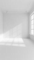 An empty white room with a single window photo
