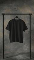 Minimalist black t-shirt on a hanger against a textured background, capturing simplicity and elegance in fashion photography. photo