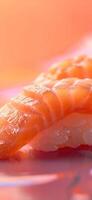 Close-up of a delicious salmon nigiri sushi on a pink background, highlighting the freshness and vibrant colors of the seafood and rice. photo