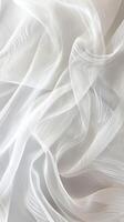 White silk fabric with wavy folds. photo