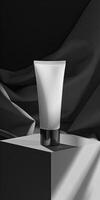 Elegant white cosmetic tube on a pedestal, featuring a minimalist black background. Perfect for skincare or beauty product advertisement. photo