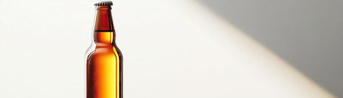 1 A highkey image of a craft beer bottle, light streaming through to highlight its contents, set against a stark white background, broad space on the left for promotional text photo
