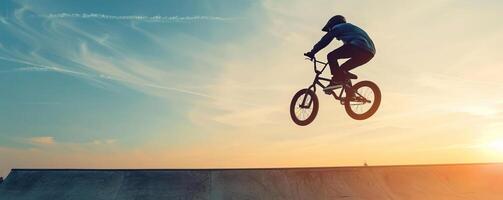 BMX rider performing a trick in midair at a skatepark, showcasing skill and agility, Extreme Sports in Action, editorial photography, empty space for text on left photo
