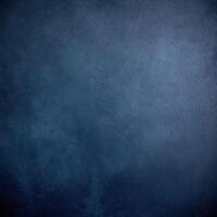 Dark blue grunge textured background, ideal for design projects, backdrops, and creative applications with a moody, vintage feel. photo