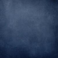 Dark blue grunge textured background, ideal for design projects, backdrops, and creative applications with a moody, vintage feel. photo