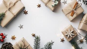 Christmas gifts wrapped in brown paper with strings and natural decorations, placed on a white background. photo