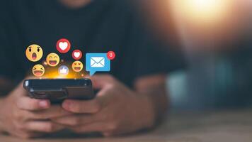 Using social media via smartphone ,internet of things, network icon connection, social marketing, digital online ,information technology ,Talking communicating using symbols and expressing feelings photo