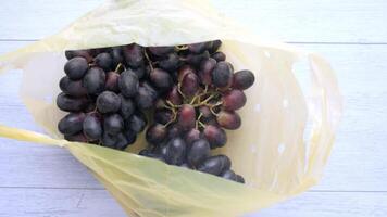 fresh grape fruit in a plastic packet on a table video
