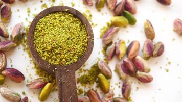 natural pistachios paste and nuts on white background video