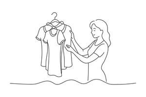 Young woman choosing blouse in the clothes shop One line continuous line art illustration on white background vector