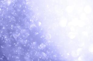 Abstract background with specks of light photo