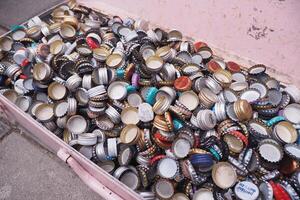 turkey istanbul 18 january 2024. Assorted bottle caps create a colorful background, ideal for beverage, beer, and soda designs photo