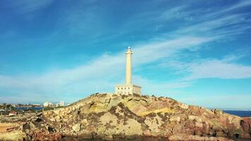 Aerial view of Cabo de Palos lighthouse near Mar Menor Spain video