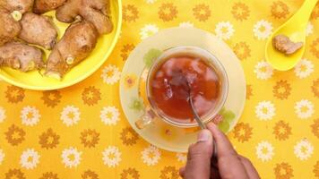 Ginger tea on wooden background video