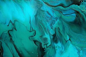 Fluid Art. Green and blue abstract wave swirls on black background. Marble effect background or texture photo