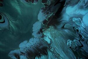 Fluid Art. Metallic Green and blue abstract waves on black background. Marble effect background or texture photo