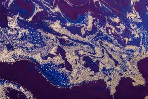 Luxury Purple Waves Pattern with Gold sparkles. Acrylic Fluid Art. Abstract Art Deco background or texture photo